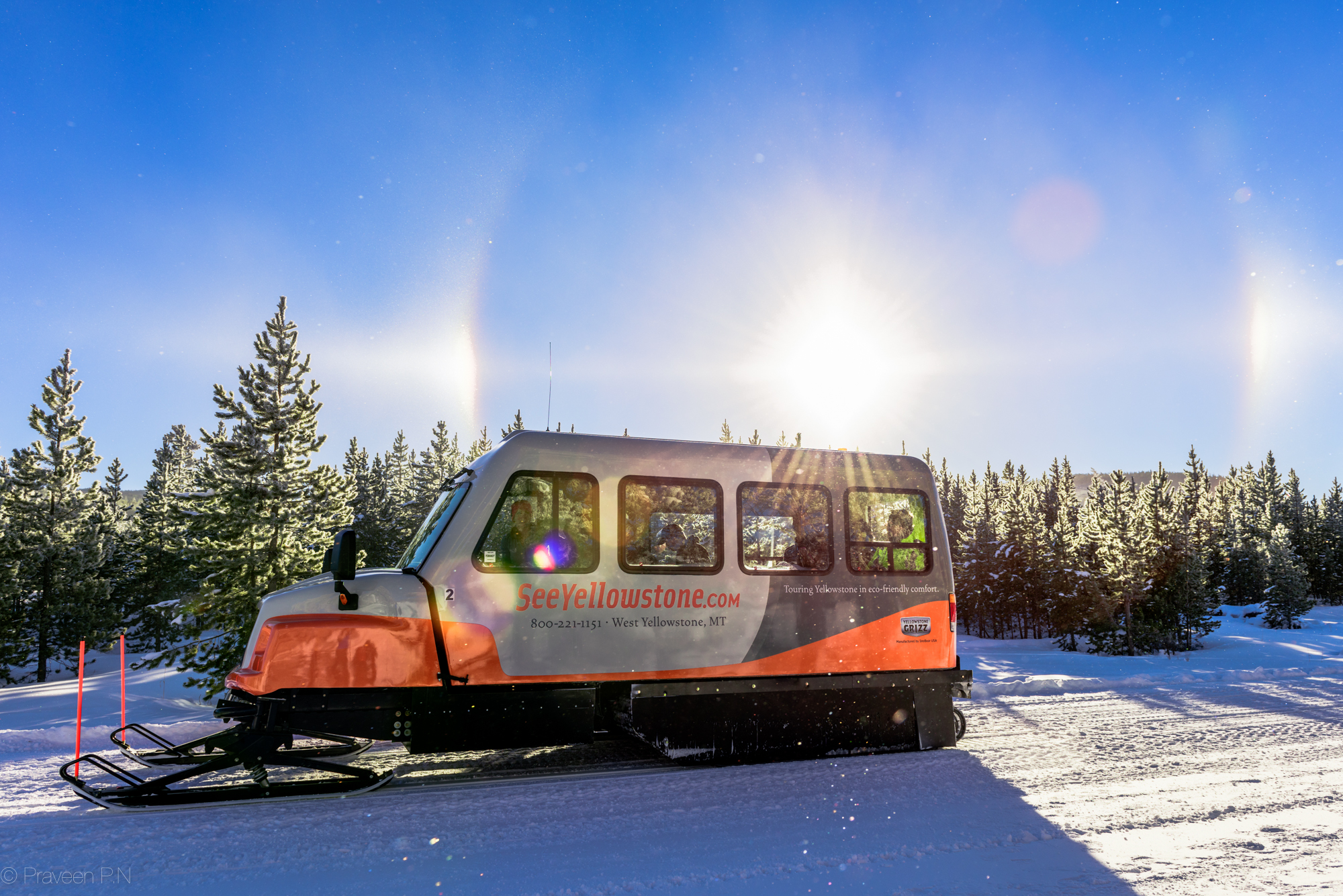 Sun dogs and Diamond dust around a snowcoach